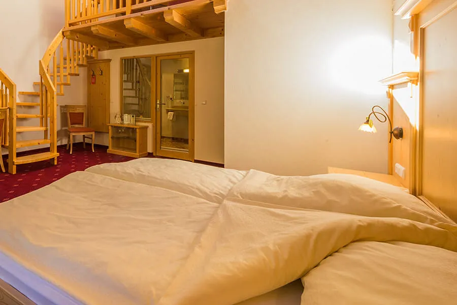 Ochsalm Zimmer – gemütliches Doppelbett im Gasthof OchsAlm